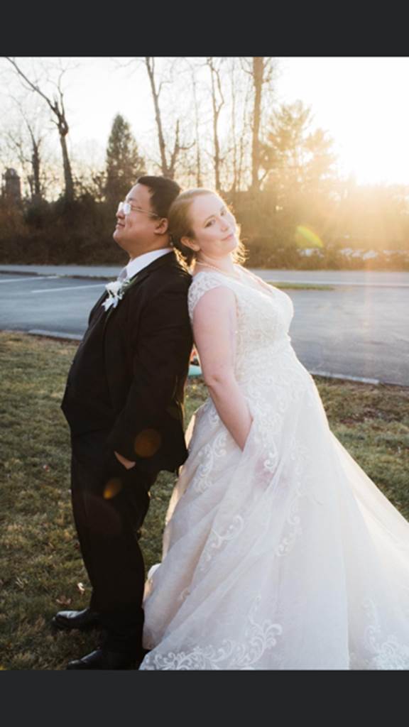 A person and person posing for a picture outside

Description automatically generated with low confidence